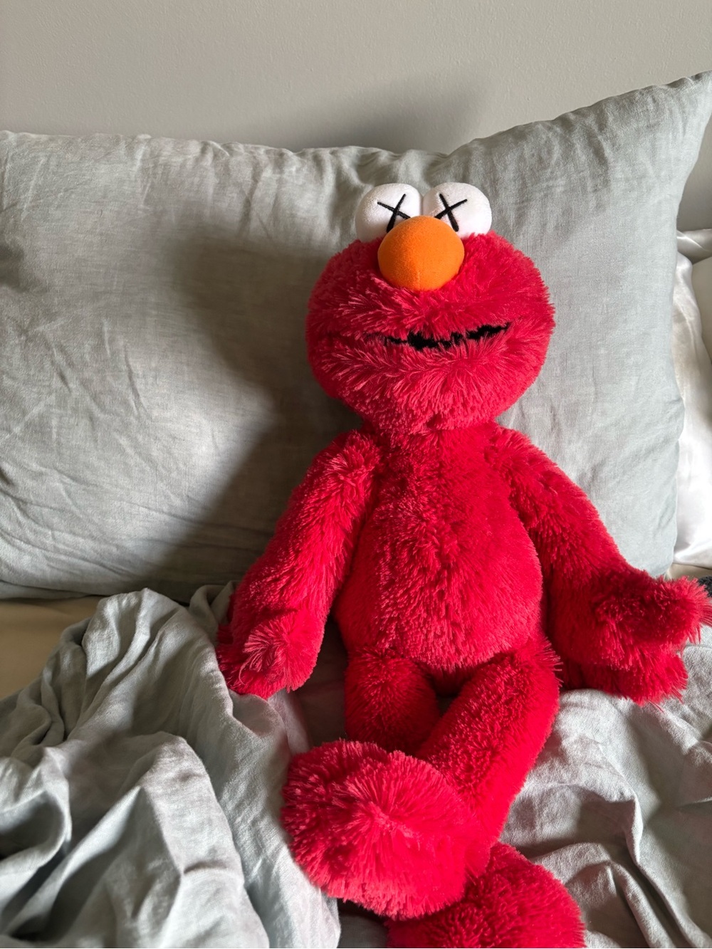 Kaws x Sesame Street Uniqlo Plush